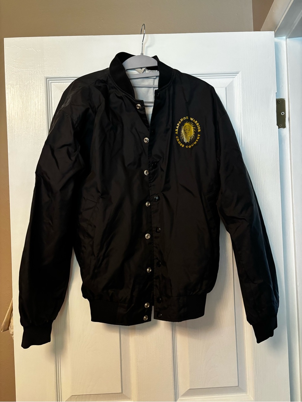 Black Bomber Jacket with Yellow Crest